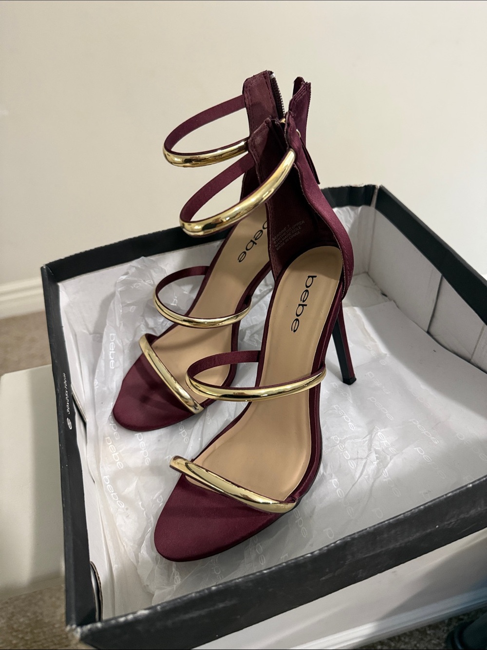 bebe Burgundy and Gold Ring-Strap Stiletto Sandals